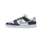 Women's navy and white Nike Dunk Low sneaker with gray swoosh, casual fashion footwear