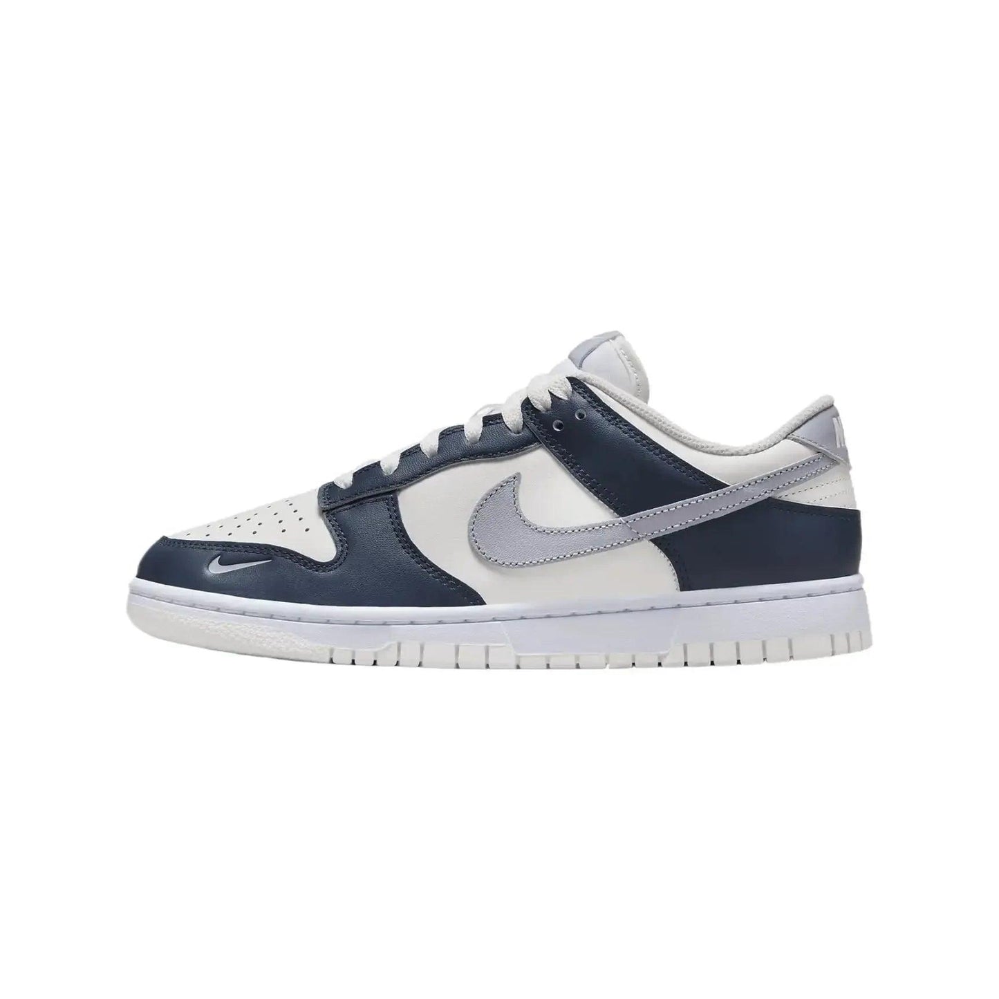 Women's navy and white Nike Dunk Low sneaker with gray swoosh, casual fashion footwear
