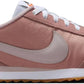 Pink Nike Cortez sneaker with white laces and gum sole, women's fashion footwear