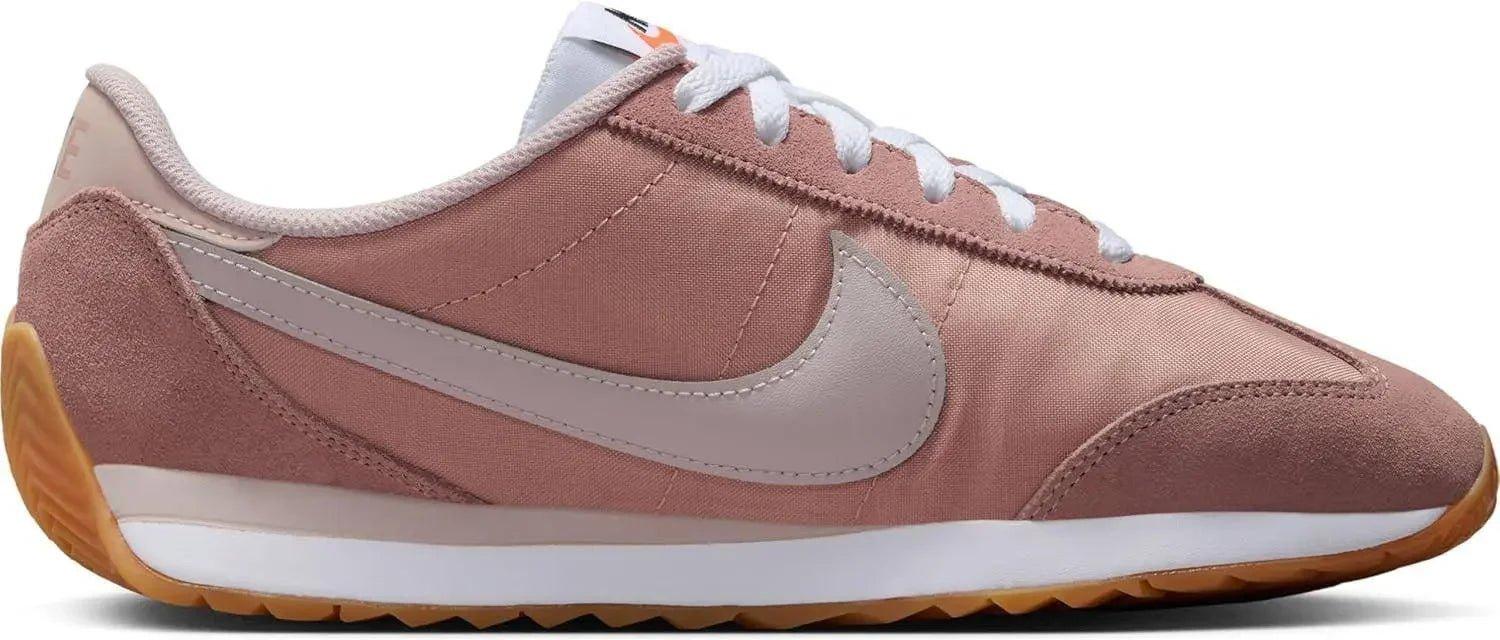 Pink Nike Cortez sneaker with white laces and gum sole, women's fashion footwear