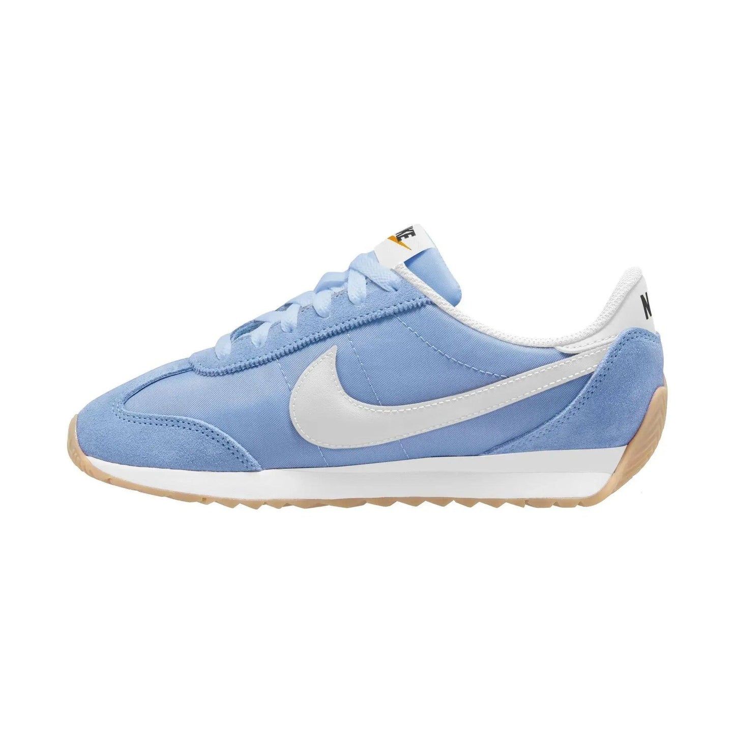 Light blue Nike sneaker with white swoosh, gum sole, and retro design for women's fashion