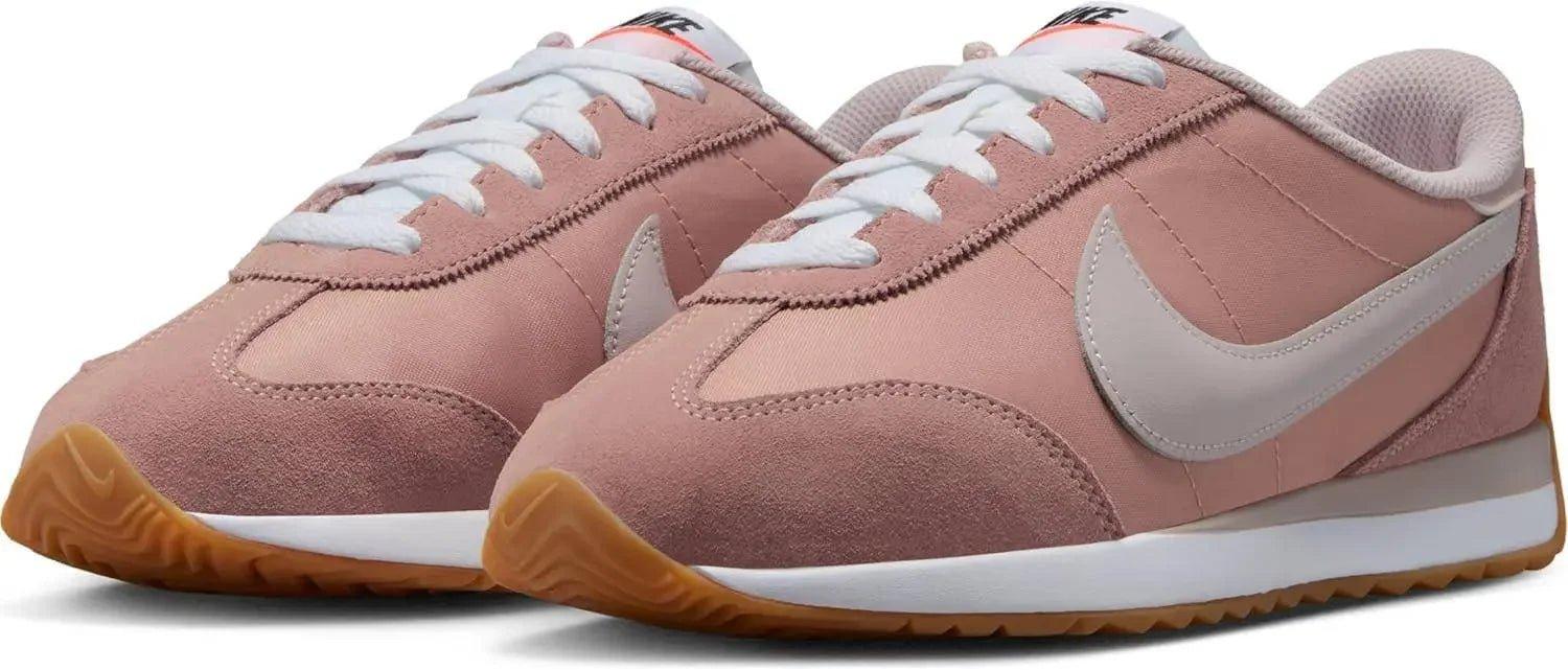 Pink Nike Cortez sneakers with white laces and gum sole, women's fashion footwear