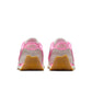 Pink Nike women's sneakers with gum sole, back view, fashion athletic shoes