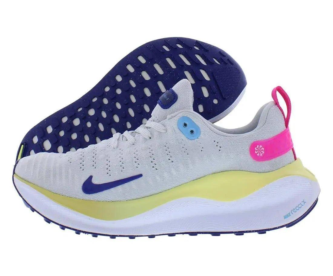 Nike React running shoe with white mesh, blue swoosh, pink heel tab, and yellow midsole for women's fashion fitness