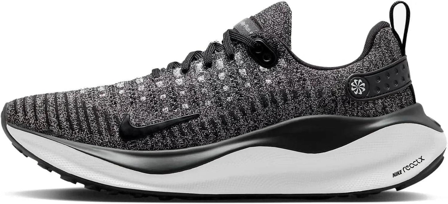 Nike React X running shoe with black and white knit upper, cushioned sole, and swoosh logo for women's fashion
