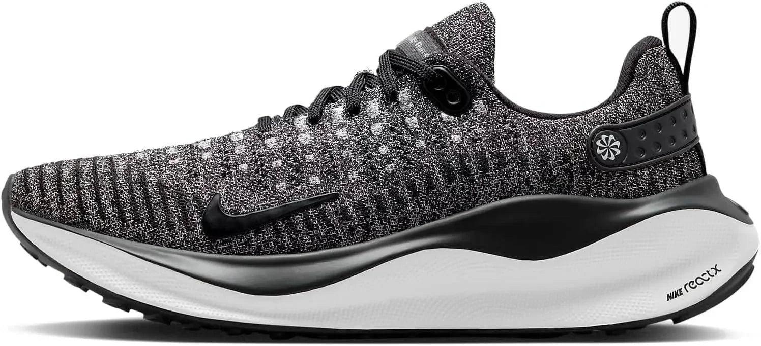 Nike React X running shoe with black and white knit upper, cushioned sole, and swoosh logo for women's fashion