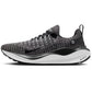 Nike React X running shoe with black and white knit upper, cushioned sole, and swoosh logo for women's fashion