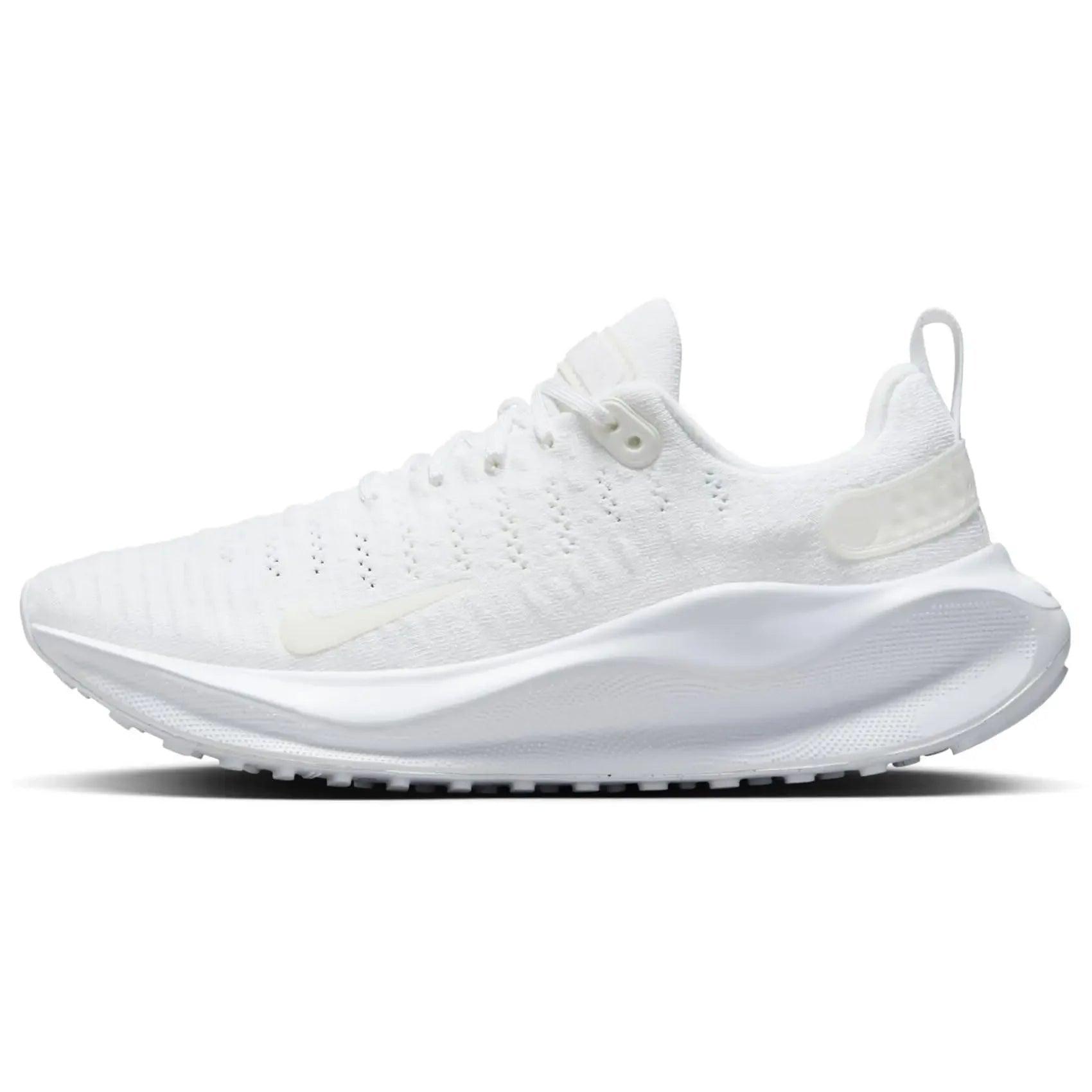 White women's running shoe with breathable knit upper and cushioned sole for comfort and style