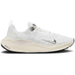 White Nike React X running shoe with silver swoosh, breathable knit upper, and cushioned sole for women's fashion