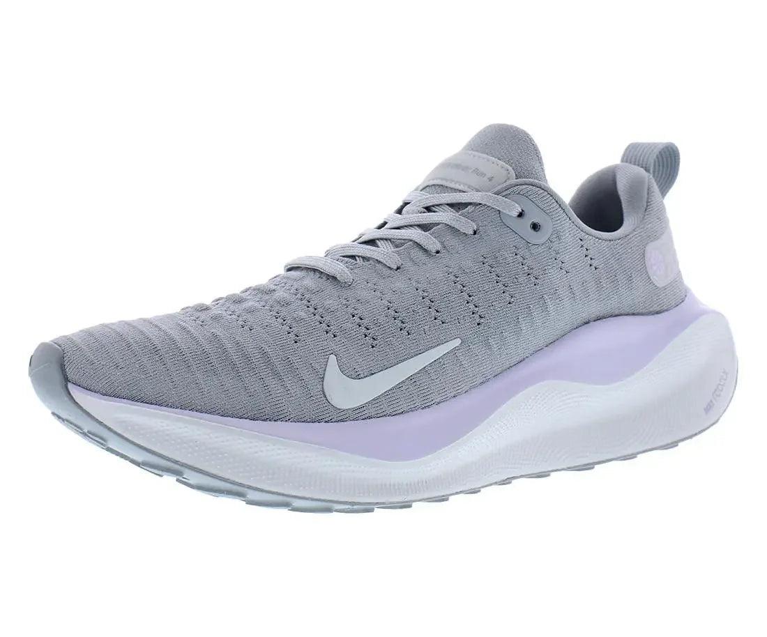 Gray Nike running shoe with lavender sole, breathable knit upper, and white swoosh logo for women's fitness