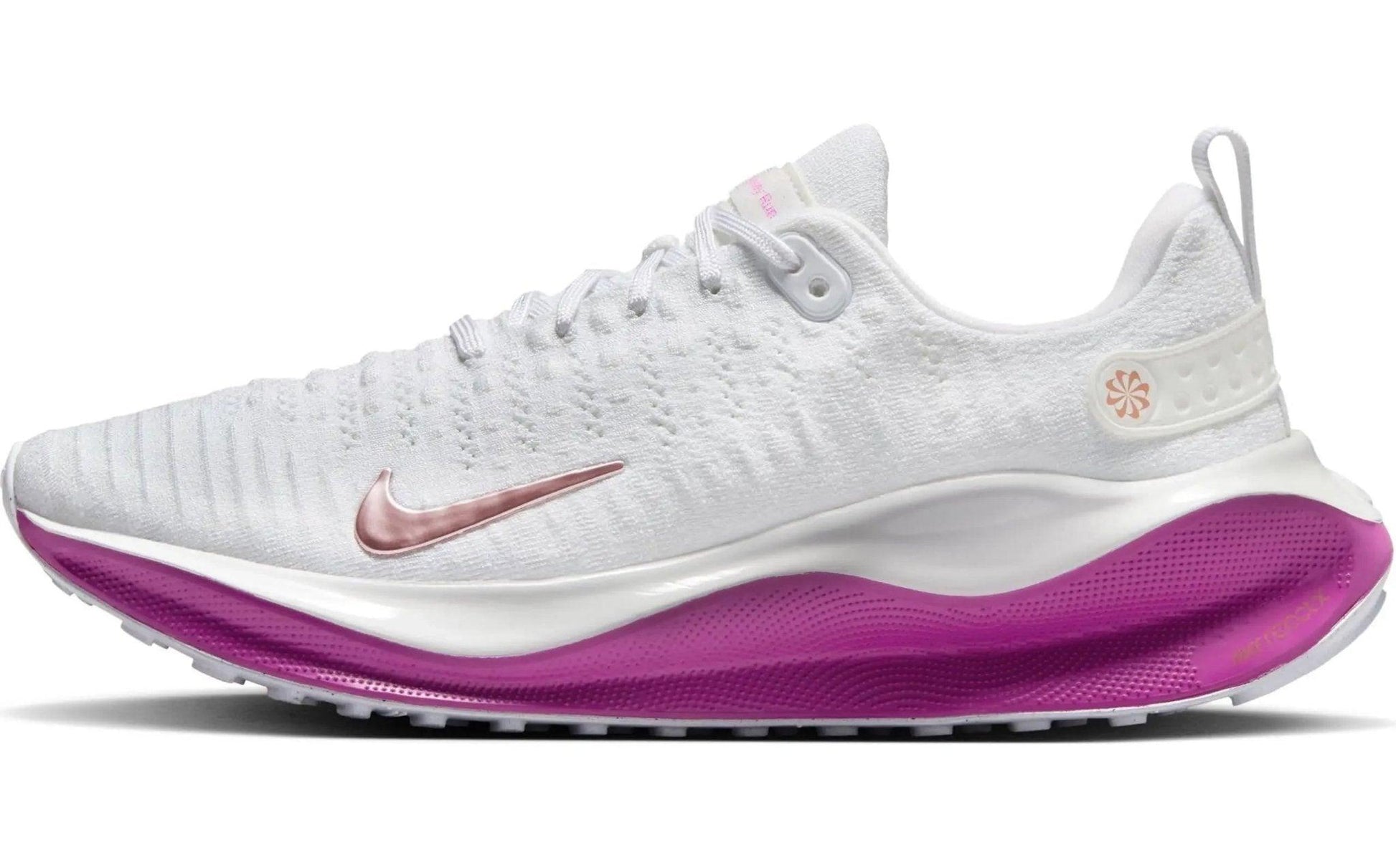 White Nike running shoe with pink swoosh and purple sole, women's athletic footwear