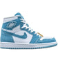 Light blue and white high-top sneaker with denim texture, Nike swoosh, and gold lace detail