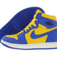 Blue and yellow Air Jordan 1 high-top sneaker with Nike swoosh, ideal for women's fashion and streetwear style