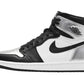 Black and silver high-top sneaker with Nike swoosh and Air Jordan logo, stylish women's fashion footwear