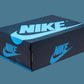 Nike Air Jordan 1985 shoe box with bold blue logo on black packaging