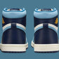 Blue and navy high-top sneakers with gold logo, white sole, and suede accents for women's fashion
