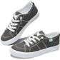 Gray canvas women's sneakers with white laces and distressed trim, casual fashion footwear