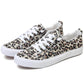 Leopard print women's canvas sneakers with white laces and soles, trendy fashion footwear