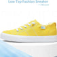 Yellow low top fashion sneaker with white laces and platform sole for women's casual wear