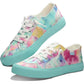 Pastel tie-dye women's canvas sneakers with mint sole, white laces, and rainbow stripe detail