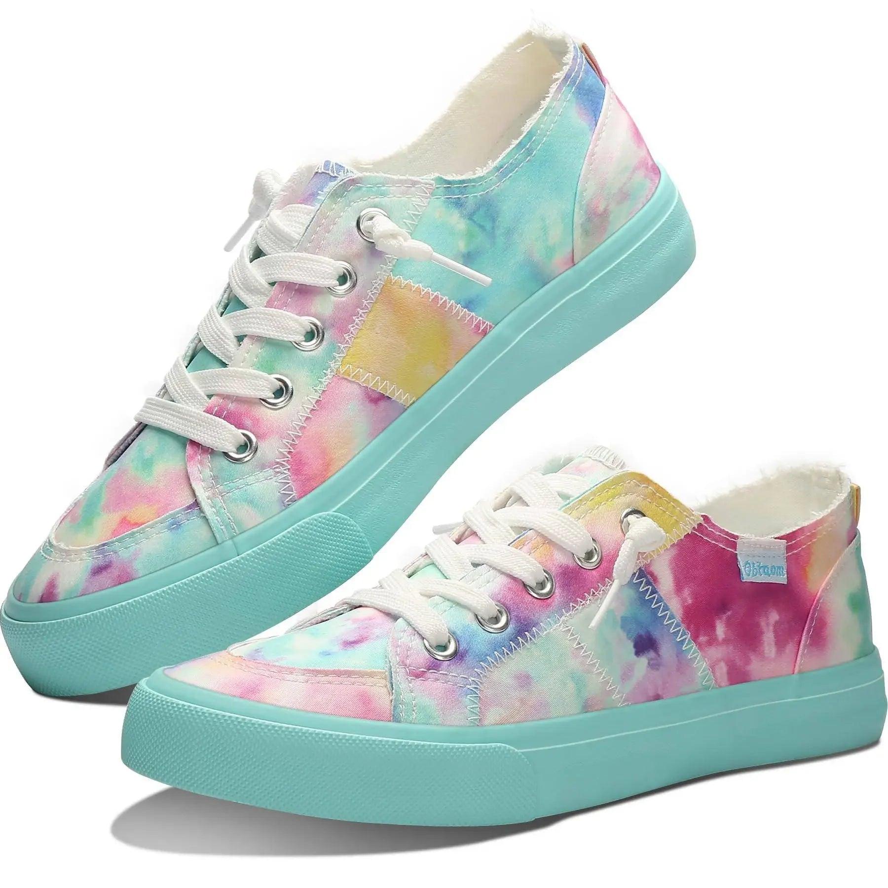 Pastel tie-dye women's canvas sneakers with mint sole, white laces, and rainbow stripe detail