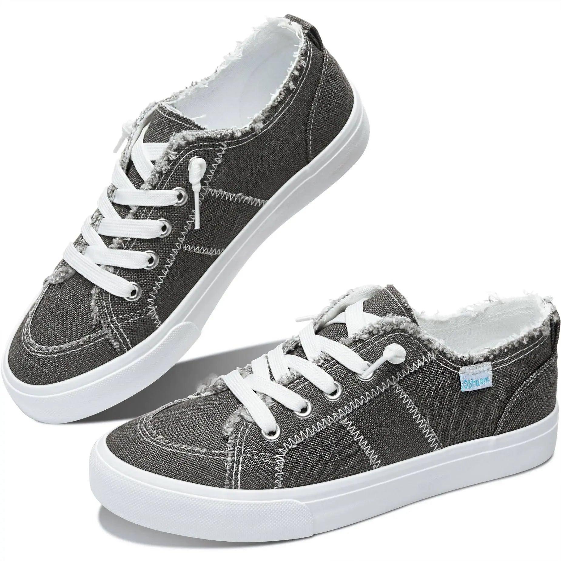 Gray canvas women's sneakers with white laces and distressed edges, casual fashion footwear
