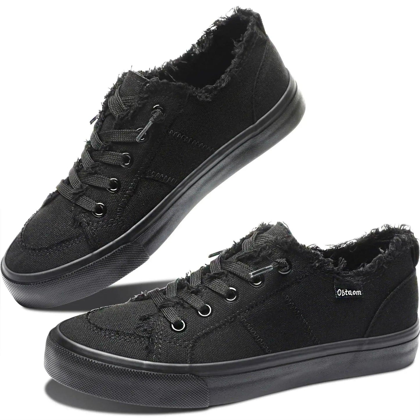 Black distressed canvas sneakers with frayed edges, perfect for women's casual fashion