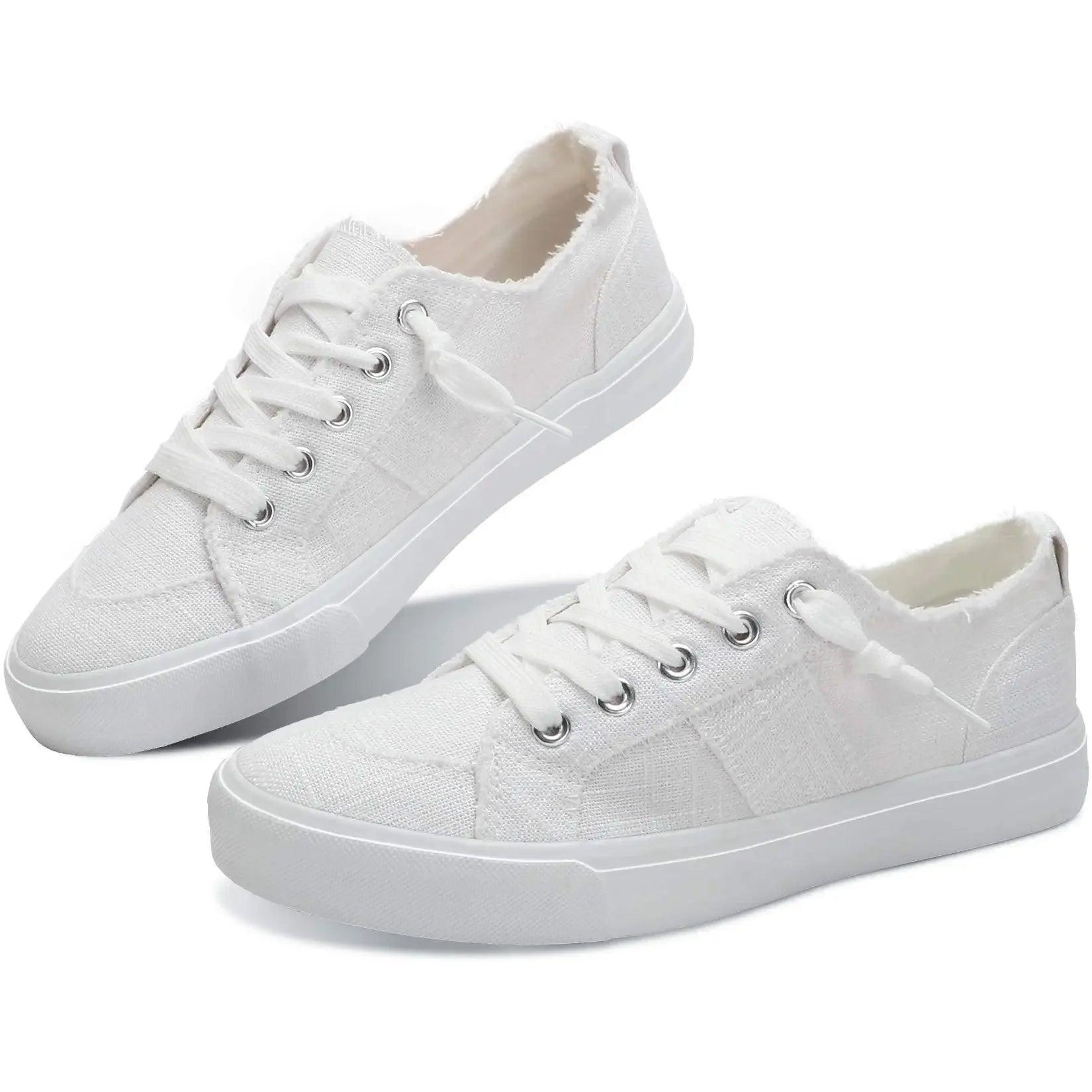 White canvas sneakers for women, casual fashion footwear with lace-up design and clean white soles