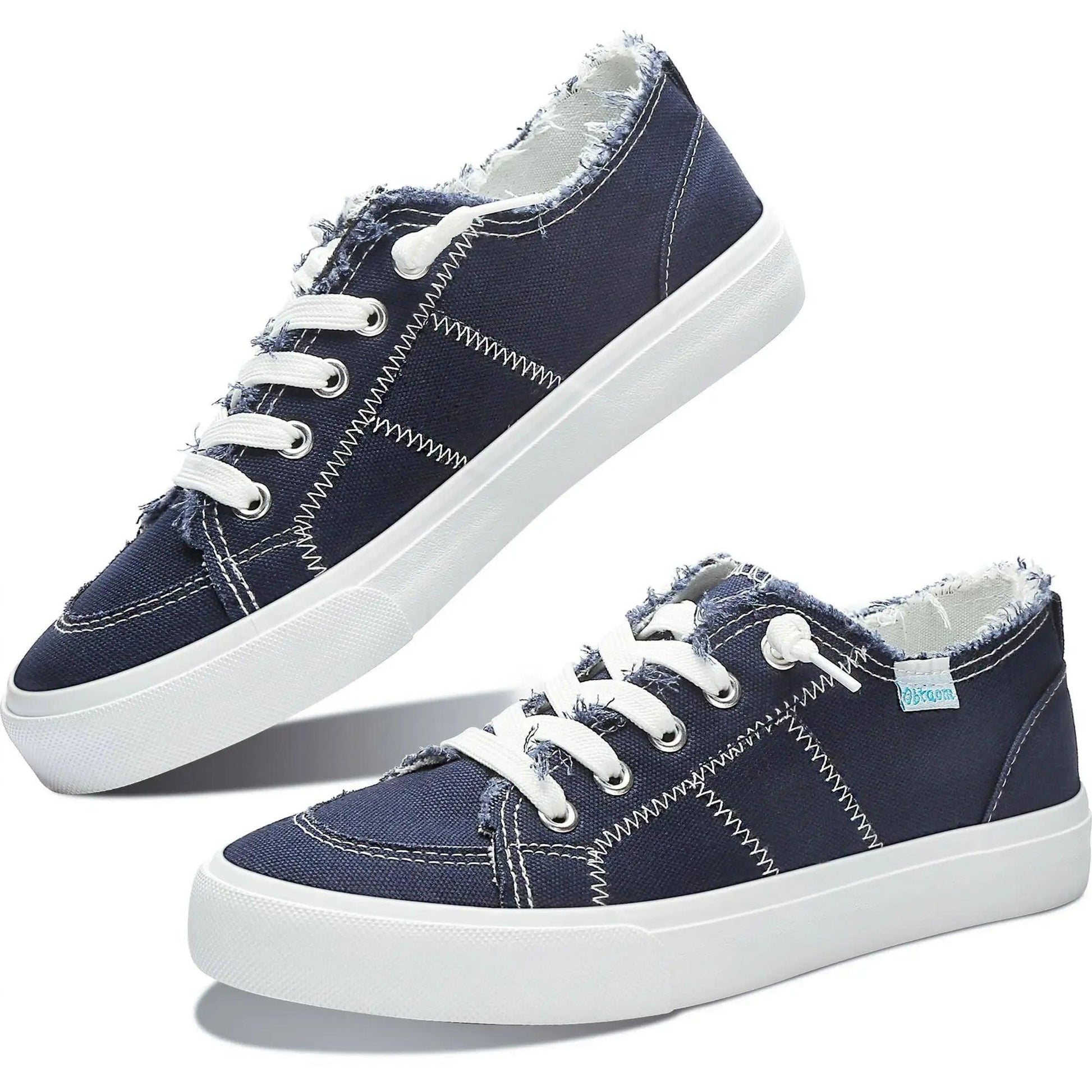 Navy blue women's canvas sneakers with white laces and distressed detailing, casual fashion footwear