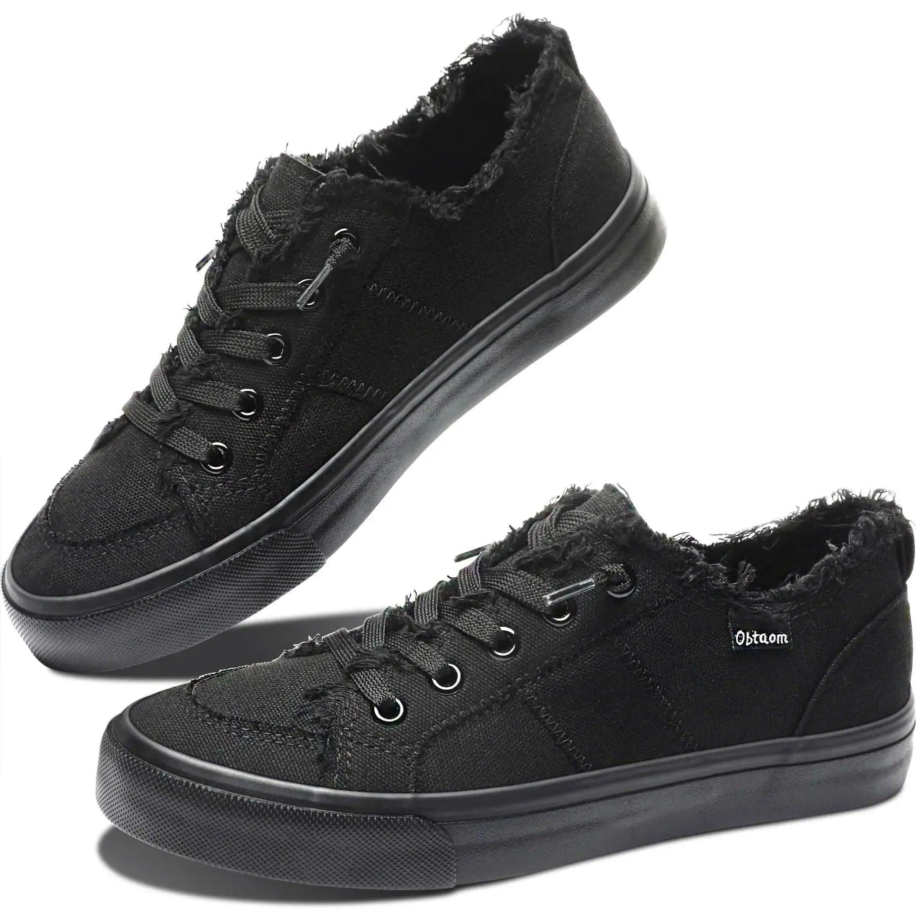Black distressed canvas sneakers with frayed edges and black laces, stylish women's fashion footwear