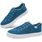 Blue canvas women's sneakers with frayed edges and white soles, casual fashion footwear