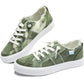 Green tie-dye canvas sneakers with white laces and distressed edges for women's fashion