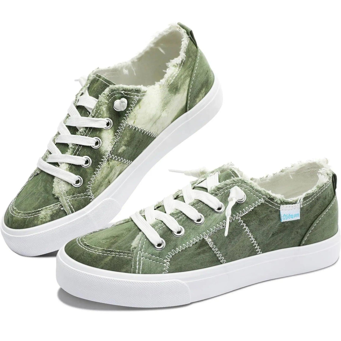 Green tie-dye canvas sneakers with white laces and distressed edges for women's fashion