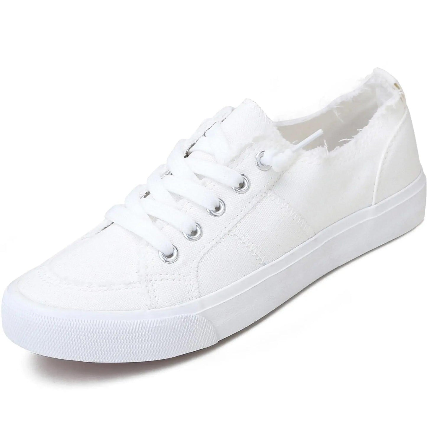 White canvas sneakers with frayed edges, perfect for women's fashion and casual wear.