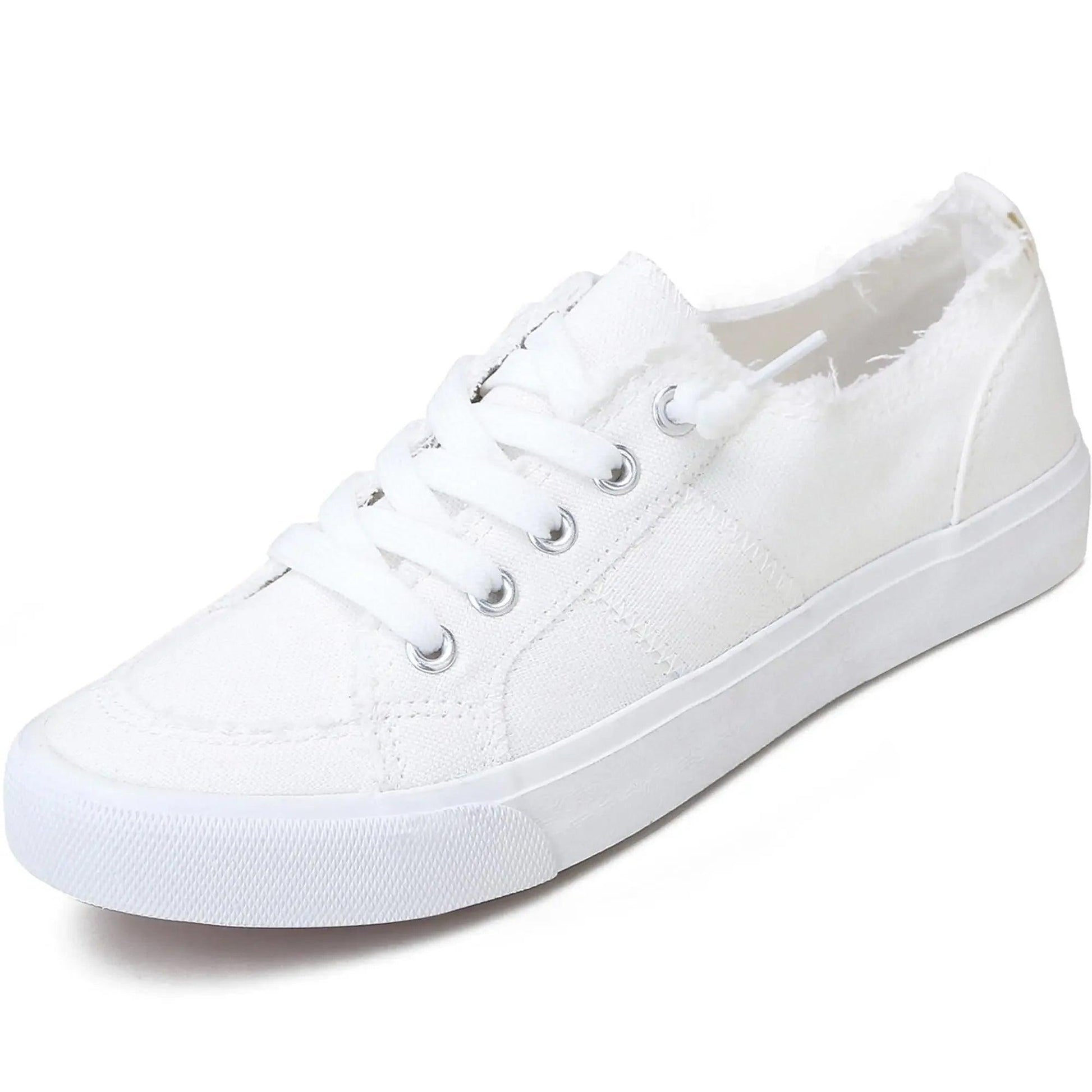 White canvas sneakers with frayed edges, perfect for women's fashion and casual wear.