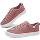 Dusty rose canvas sneakers with white soles, frayed edges, and matching laces for women's fashion
