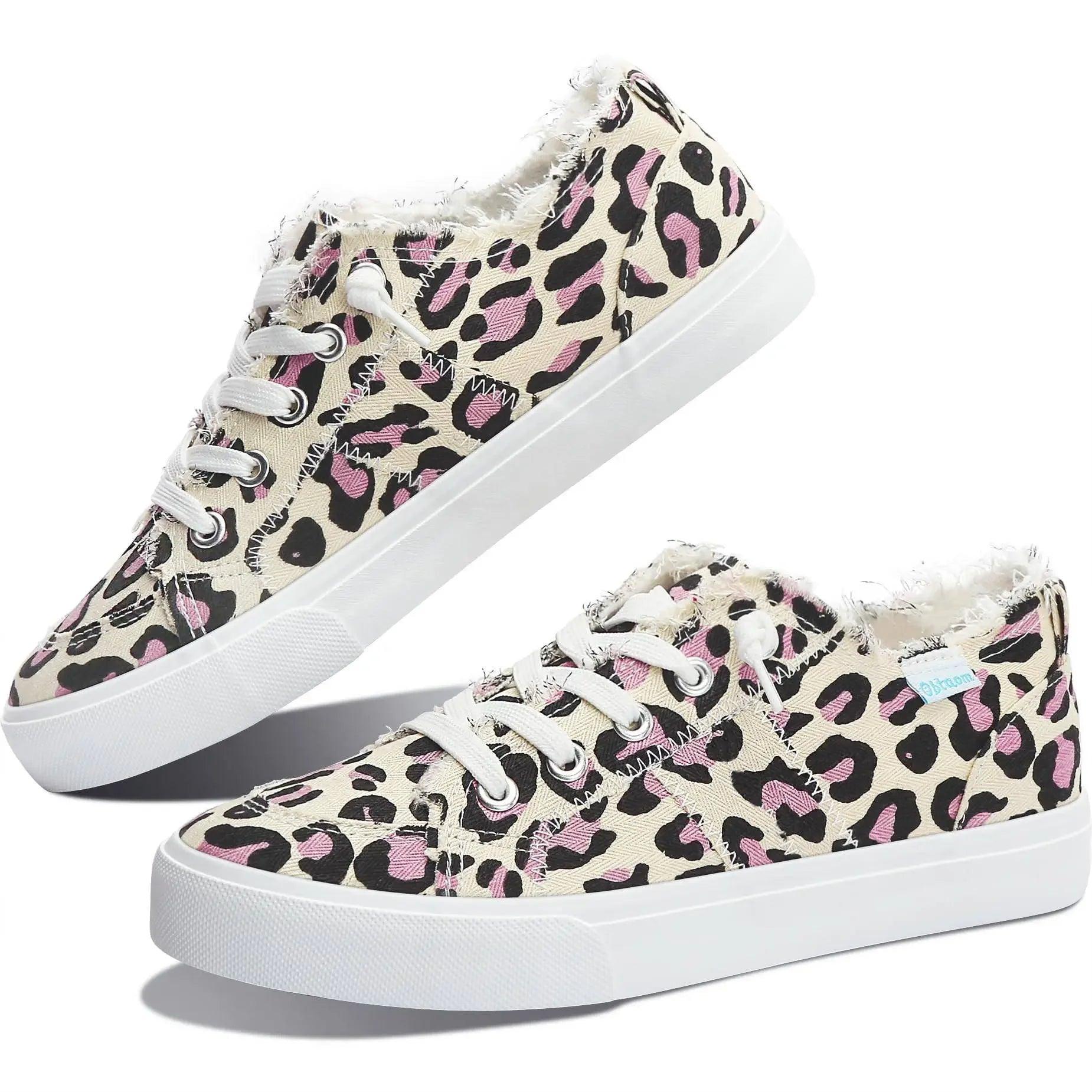 Pink and black leopard print women's canvas sneakers with white laces and frayed edges