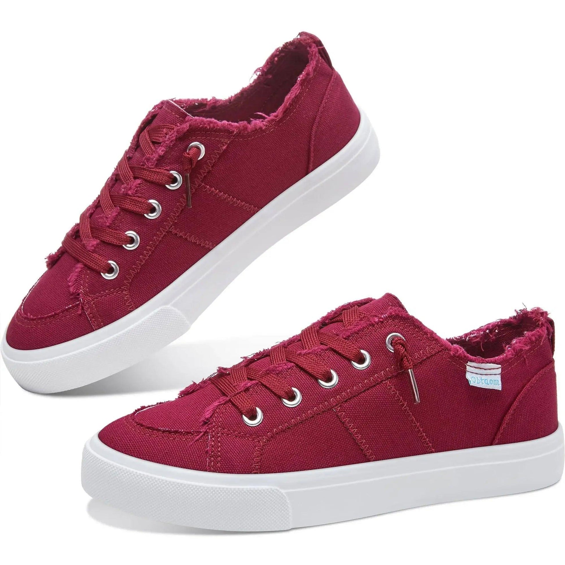 Burgundy canvas sneakers with white soles, frayed edges, and silver eyelets for women's fashion