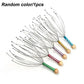 Colorful scalp massager with metal prongs and wooden handle for relaxation and hair care