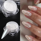 White nail powder for glossy manicure, shown with pearl-effect nails and clear jar