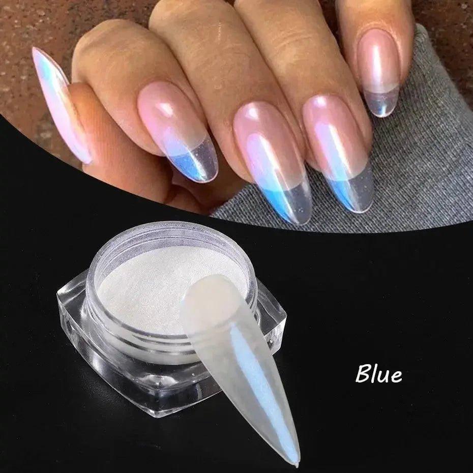 Iridescent blue nail powder for holographic ombre manicure, shown with long stiletto nails and product jar