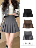Grey pleated mini skirt with varsity jacket, women's fashion outfit, available in black, brown, grey