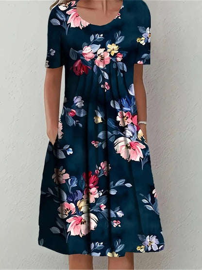 Woman wearing navy floral print dress with short sleeves and pockets, perfect for casual fashion