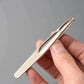 Stainless steel eyebrow tweezers for precise grooming and beauty care