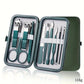 Green stainless steel manicure set with nail clippers, scissors, and tools in portable case
