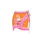 Orange and pink wrap mini skirt with castle print, floral details, and tassel tie for women's fashion