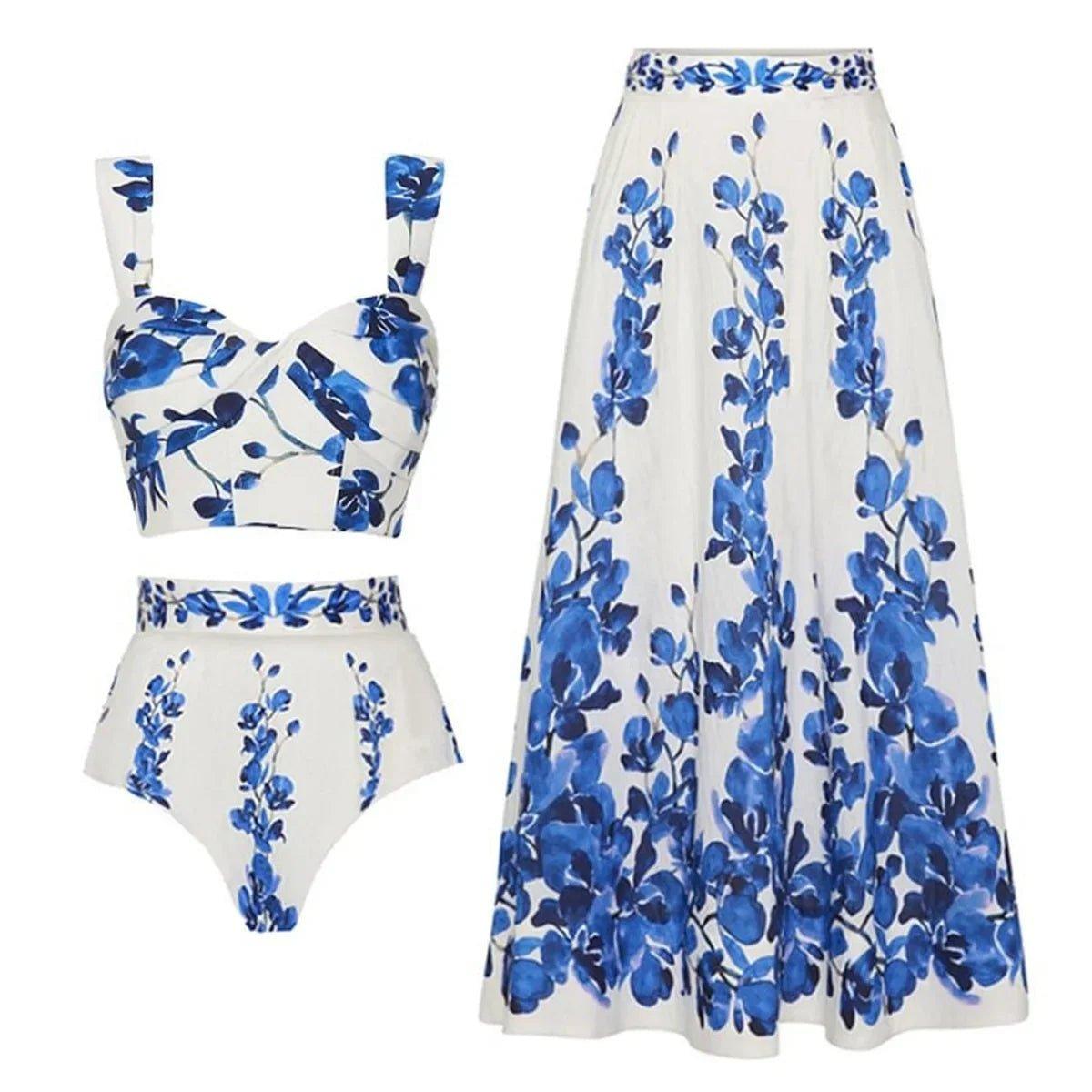 Blue floral print women's bikini set with matching maxi skirt, stylish beachwear outfit