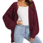 Burgundy knit cardigan with buttons, styled over white top and light jeans for women's fashion