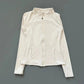 Cream white women's zip-up athletic jacket with side pockets, perfect for fitness and casual wear