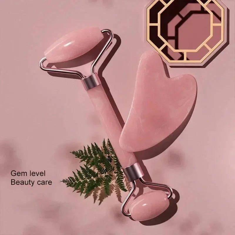 Pink jade roller and gua sha set for facial massage and beauty care